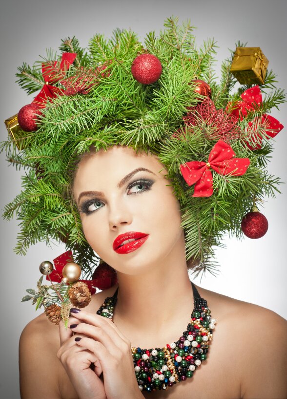 Beautiful woman with a Christmas tree for hair